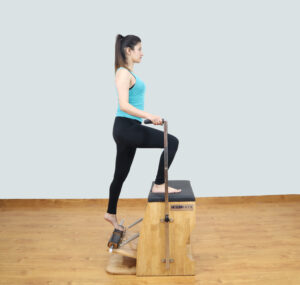 CoreKaya Pilates Wunda Chair - A versatile and ergonomic fitness chair for all levels.